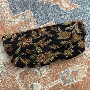 Vintage carpet clutch